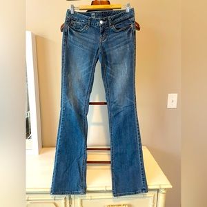 Lightly distressed boot-leg jeans